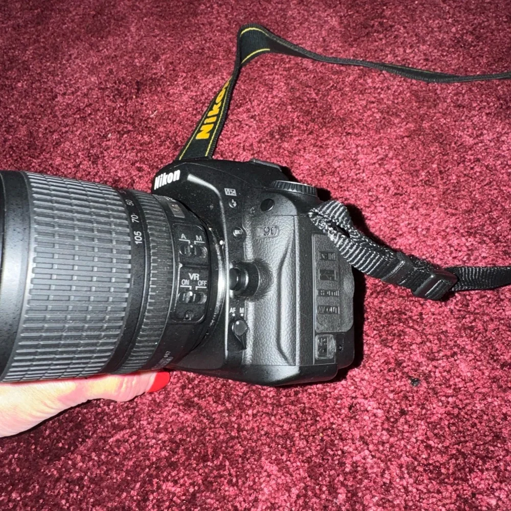 Nikon Black Digital SLR Camera with Yellow Accent Strap D90